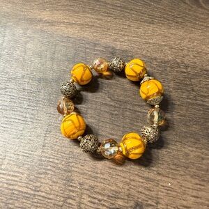 Elegant Yellow and Gold Beaded Bracelet